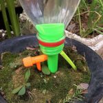 Solution d'arrosage goutte à goutte pour un jardin bien entretenu