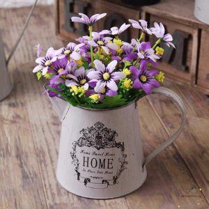 Arrosoir Vintage pour une décoration de table élégante