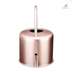 Arrosoir en rose gold pour un jardin stylé