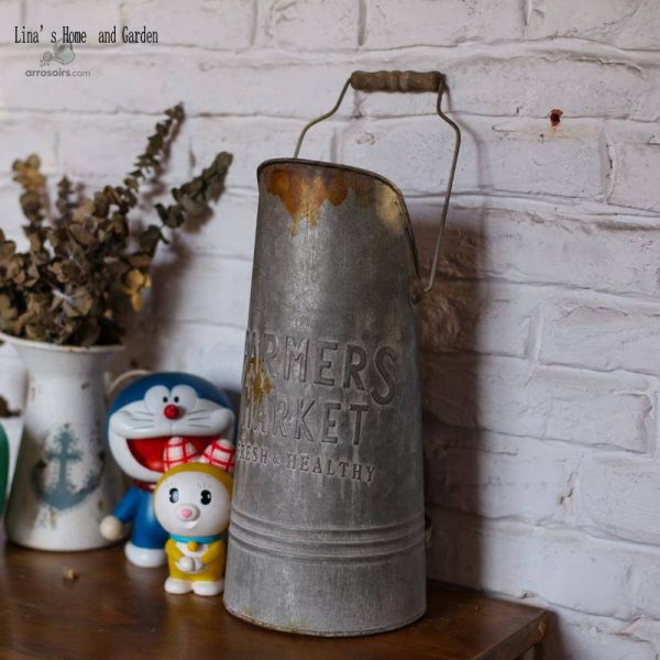 Élégant arrosoir en métal galvanisé pour la décoration