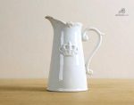 Arrosoir en porcelaine, mélange de fonctionnalité et esthétique