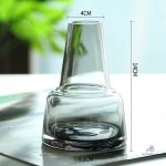 Vase en verre pour une seule tige, esthétique raffinée
