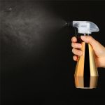 Vaporisateur doré au design élégant pour plantes aromatiques