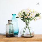 Vase en verre turquoise pour fleurs
