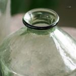 Vase rond en verre vert, style Dame Jeanne