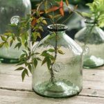 Dame Jeanne verte, pièce décorative en verre