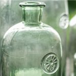 Vase Dame Jeanne, verre vert pour ambiance chaleureuse