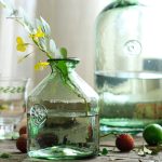 Vase en verre vert pour arrangements floraux