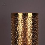 Vase design noir et doré, idéal pour les fleurs ou en solo