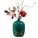 Vase design en céramique, teinte turquoise